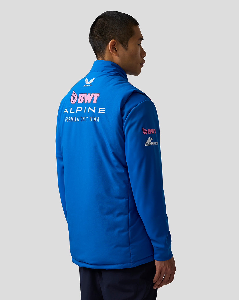 Back view of a bright blue BWT Alpine Formula One team gilet with large BWT Alpine logos on the back and a sponsor logo on the sleeve