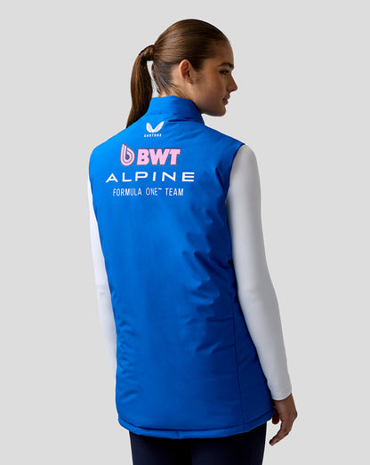 Back view of blue BWT Alpine gilet on a model with large logos across the back
