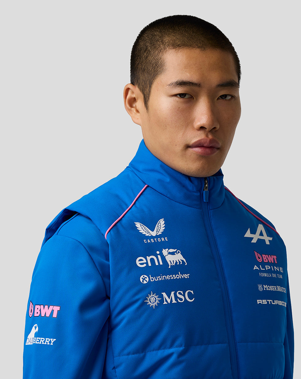 Blue BWT Alpine Formula One Team gilet worn by a male model with chest team logos