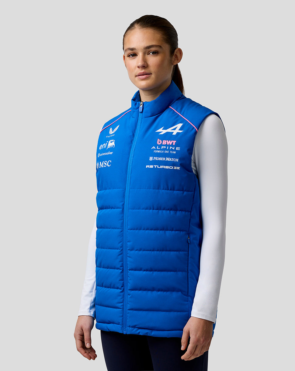Front view of blue BWT Alpine gilet worn by a model with chest logos and side zip pockets