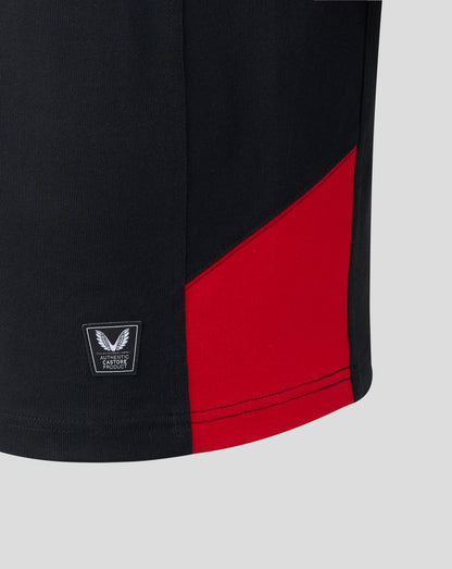Black and red athletic shirt with a brand logo on a light gray background