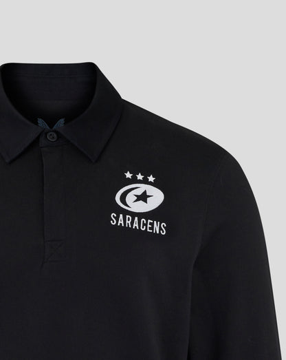 Black polo shirt with Saracens logo on a gray background