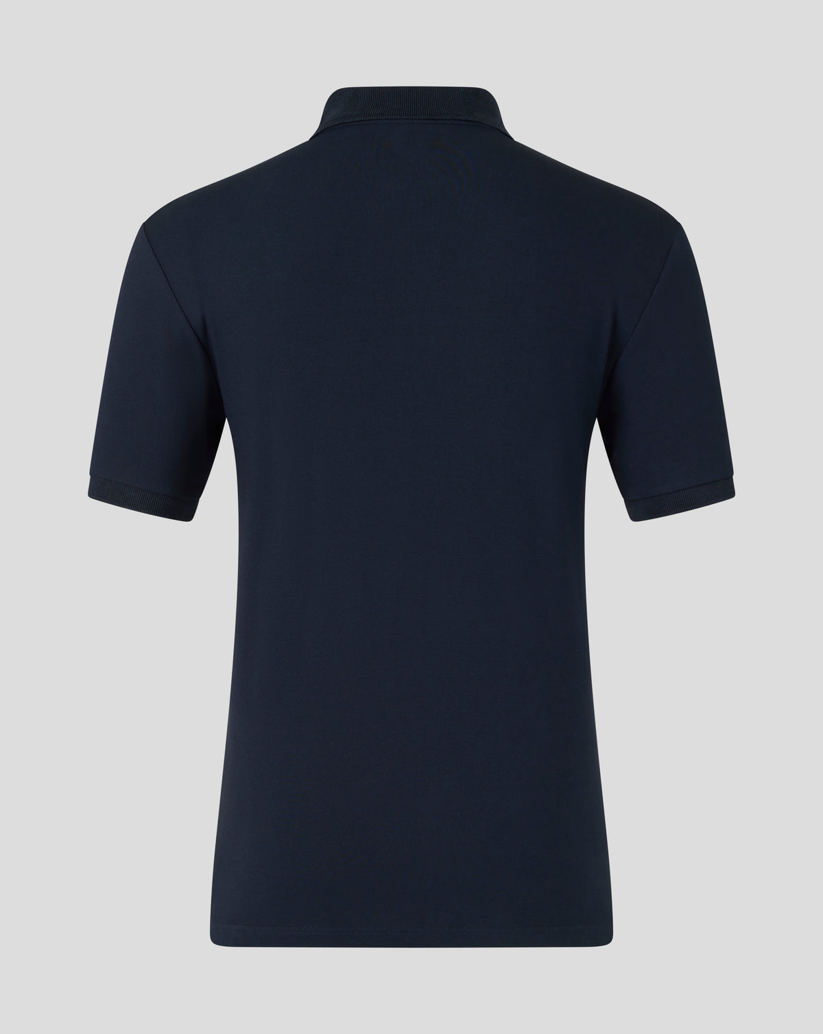 Back view of navy BWT Alpine Formula One Team Travel polo with ribbed collar and short sleeves.