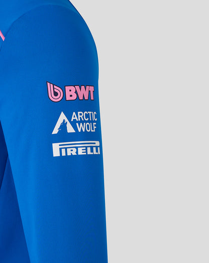 Close-up of blue sleeve displaying BWT Arctic Wolf and Pirelli sponsor logos