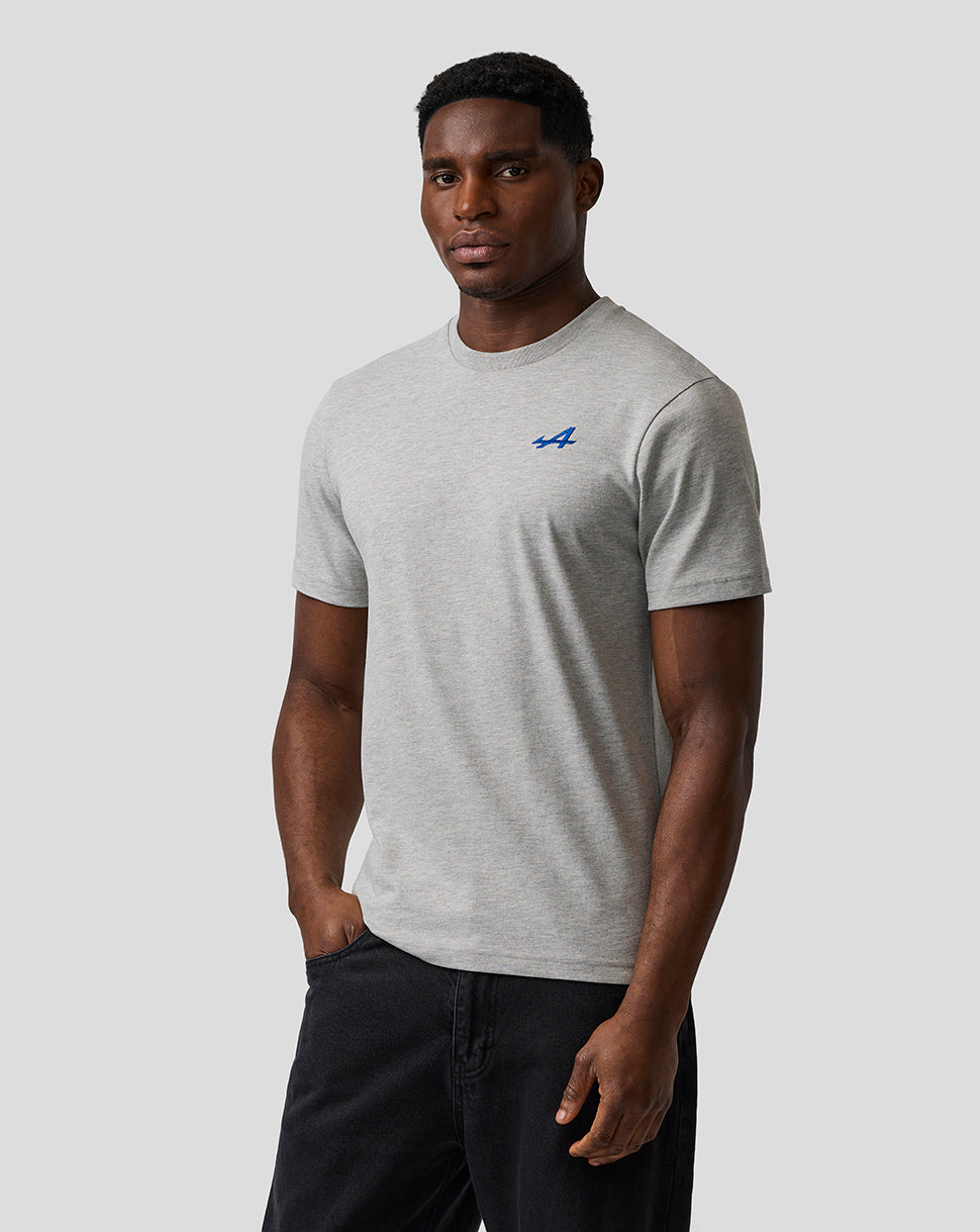 Male model wearing grey marl core T shirt with small blue chest logo.
