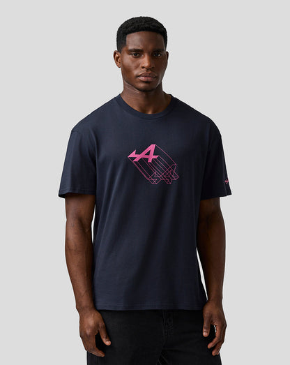 Man wearing navy unisex relaxed fit T-shirt with pink Alpine graphic on chest.
