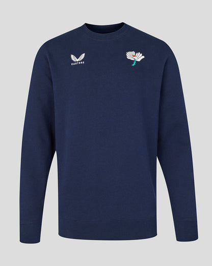Navy blue sweatshirt with embroidered designs on a light gray background