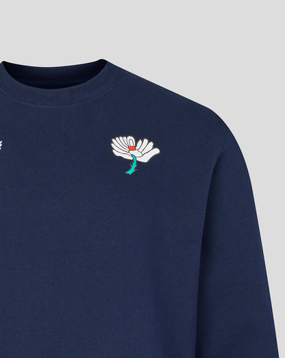 Navy blue sweatshirt with a colorful embroidered design on a light gray background