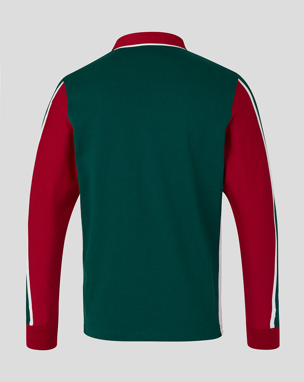 Green and red sports top with white stripes on a gray background