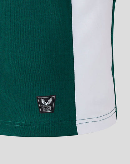 Green and white shorts with a logo on a white background