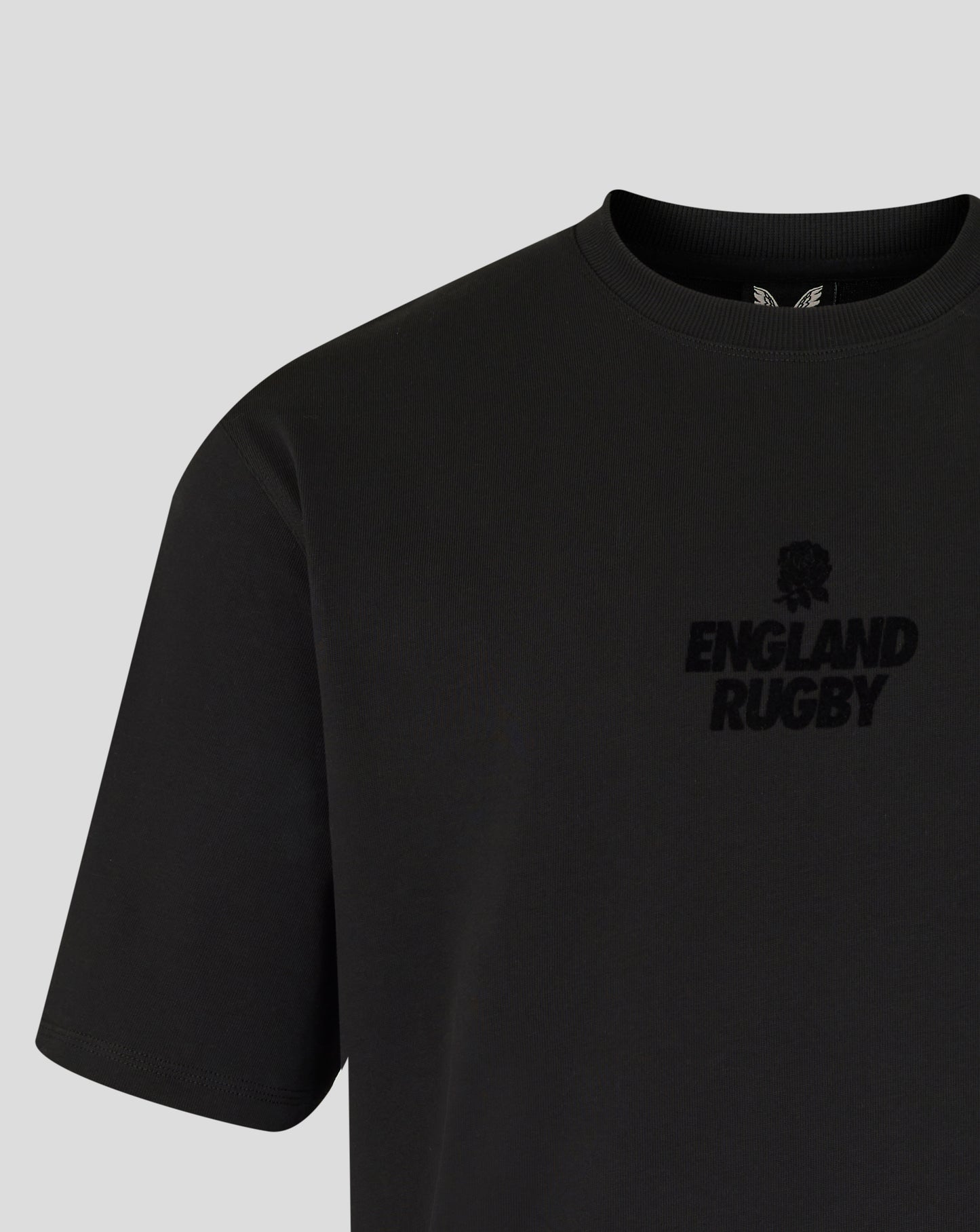 Black t-shirt with 'England Rugby' logo on a light gray background
