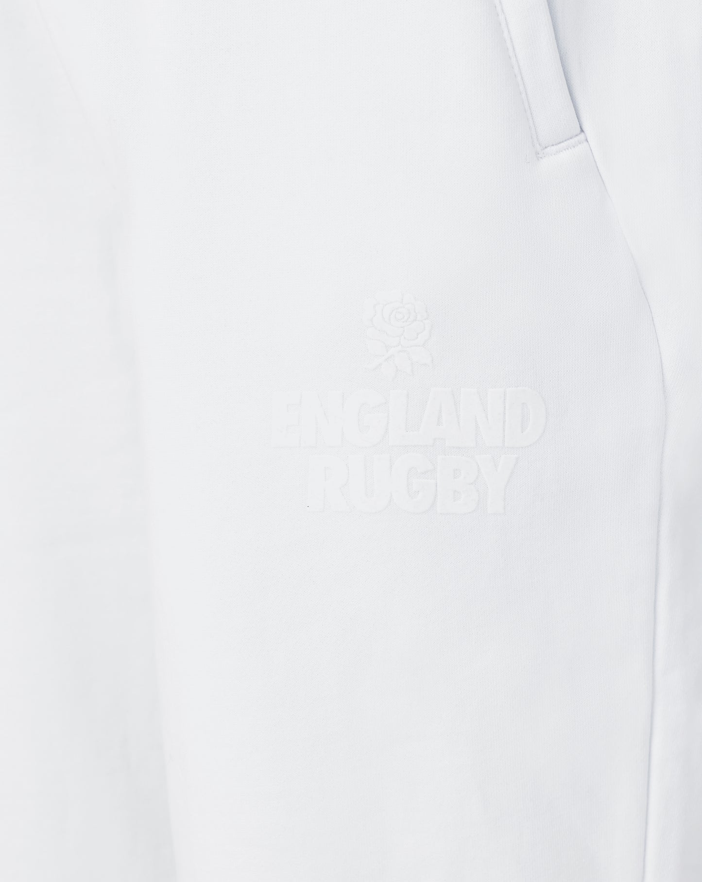 Close-up of white joggers