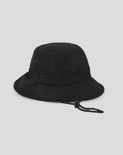 Black bucket hat with a brand logo on a light gray background
