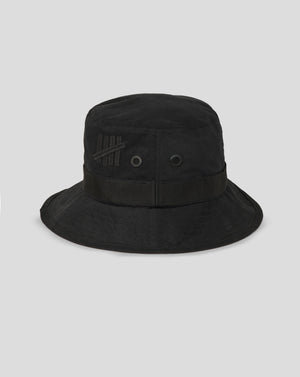 Black bucket hat with a brand logo on a light gray background