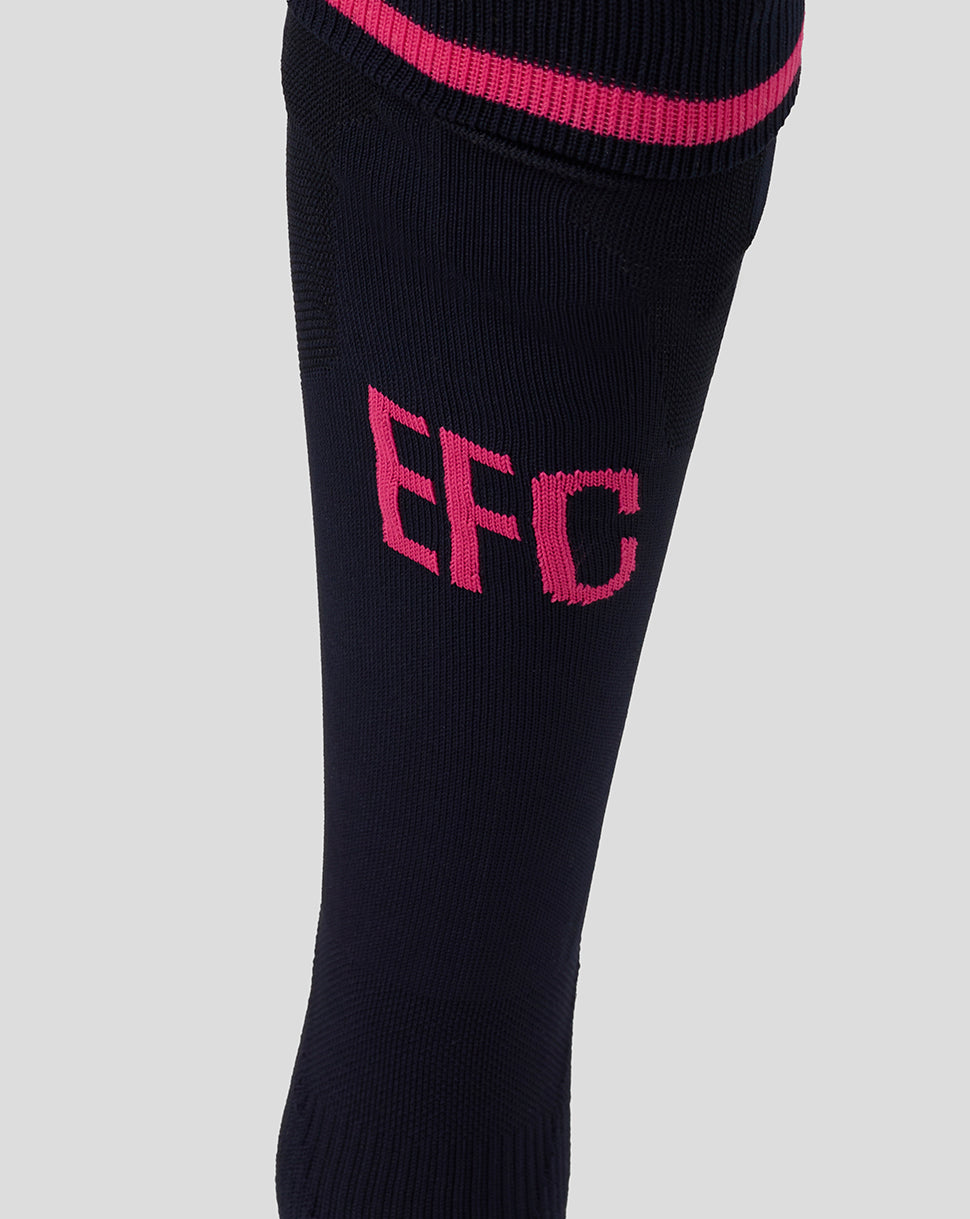 Black knee-high sock with pink 'EFC' lettering on a light gray background