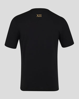 Back view of black Feyenoord Twelfth shirt with gold XII roman numeral on the upper back