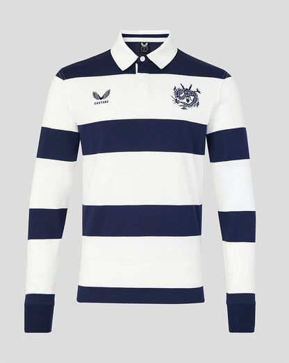 White and navy striped long-sleeve rugby shirt with brand logos on a gray background