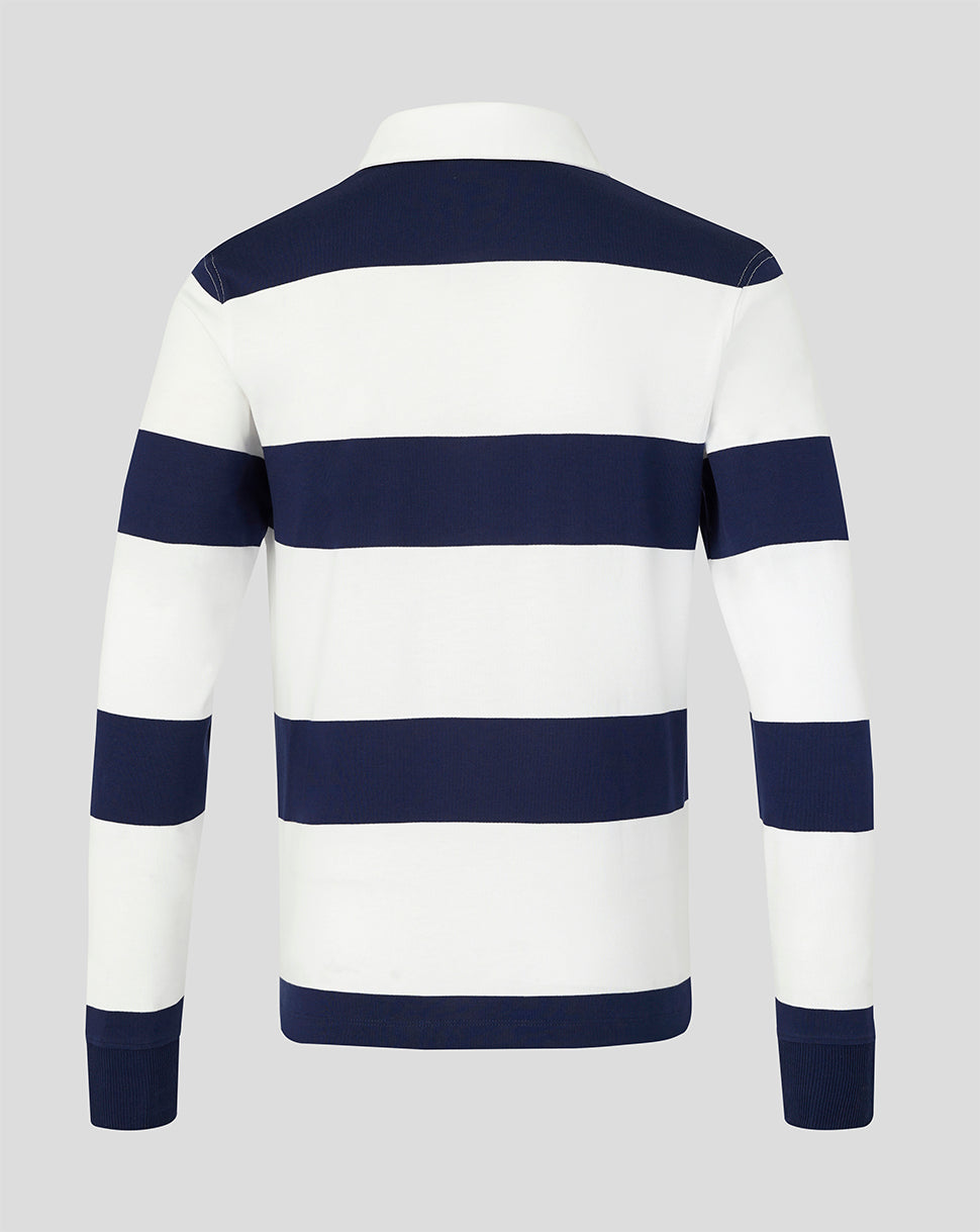 Navy and white striped sweater on a gray background