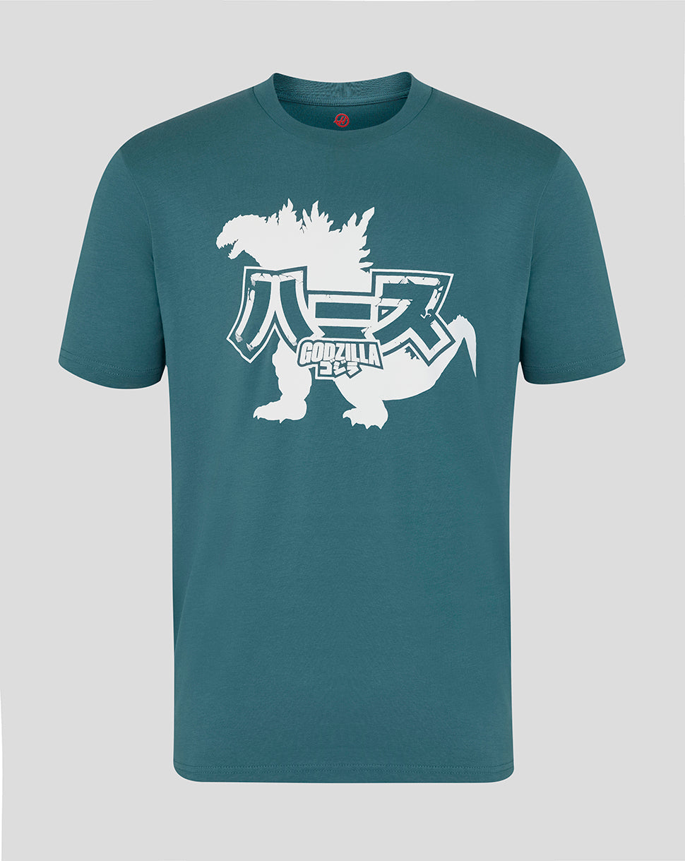Teal t-shirt with Godzilla graphic on a gray background