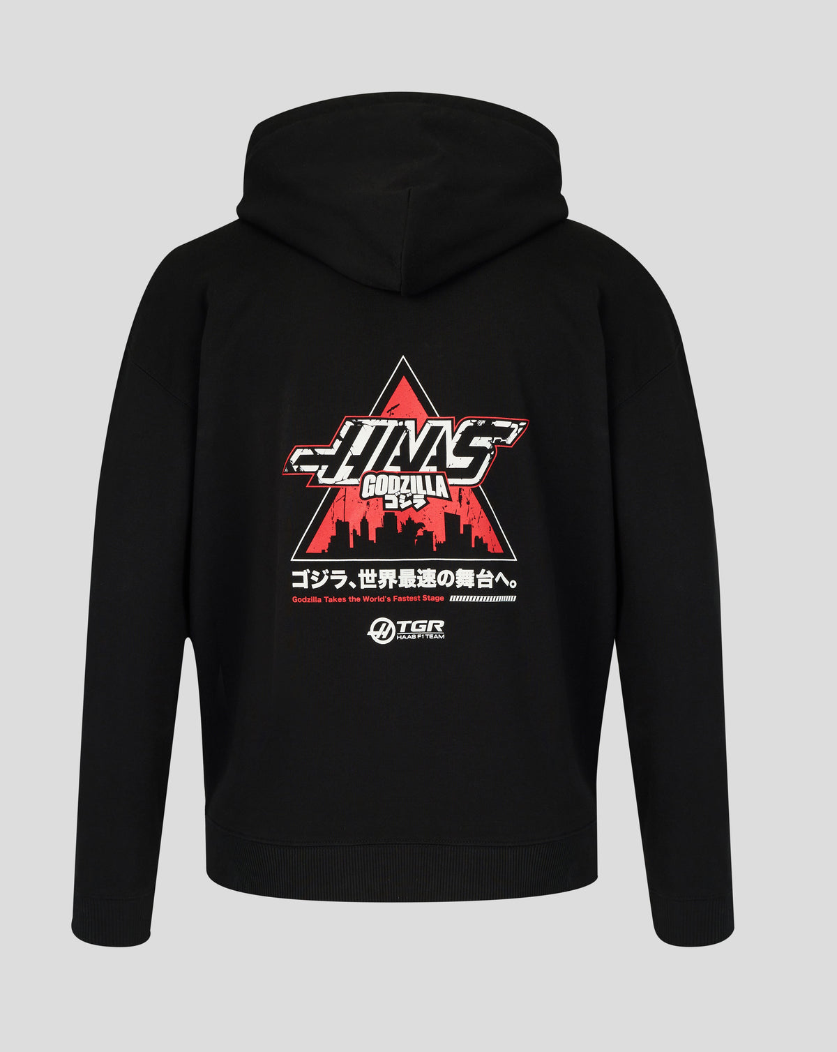 Black hoodie with a graphic design on the back against a gray background