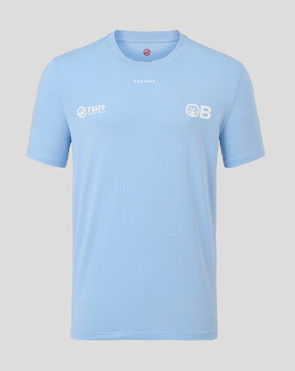 A light blue short-sleeve crewneck t-shirt with white printed logos on the chest, displayed against a solid light gray background.