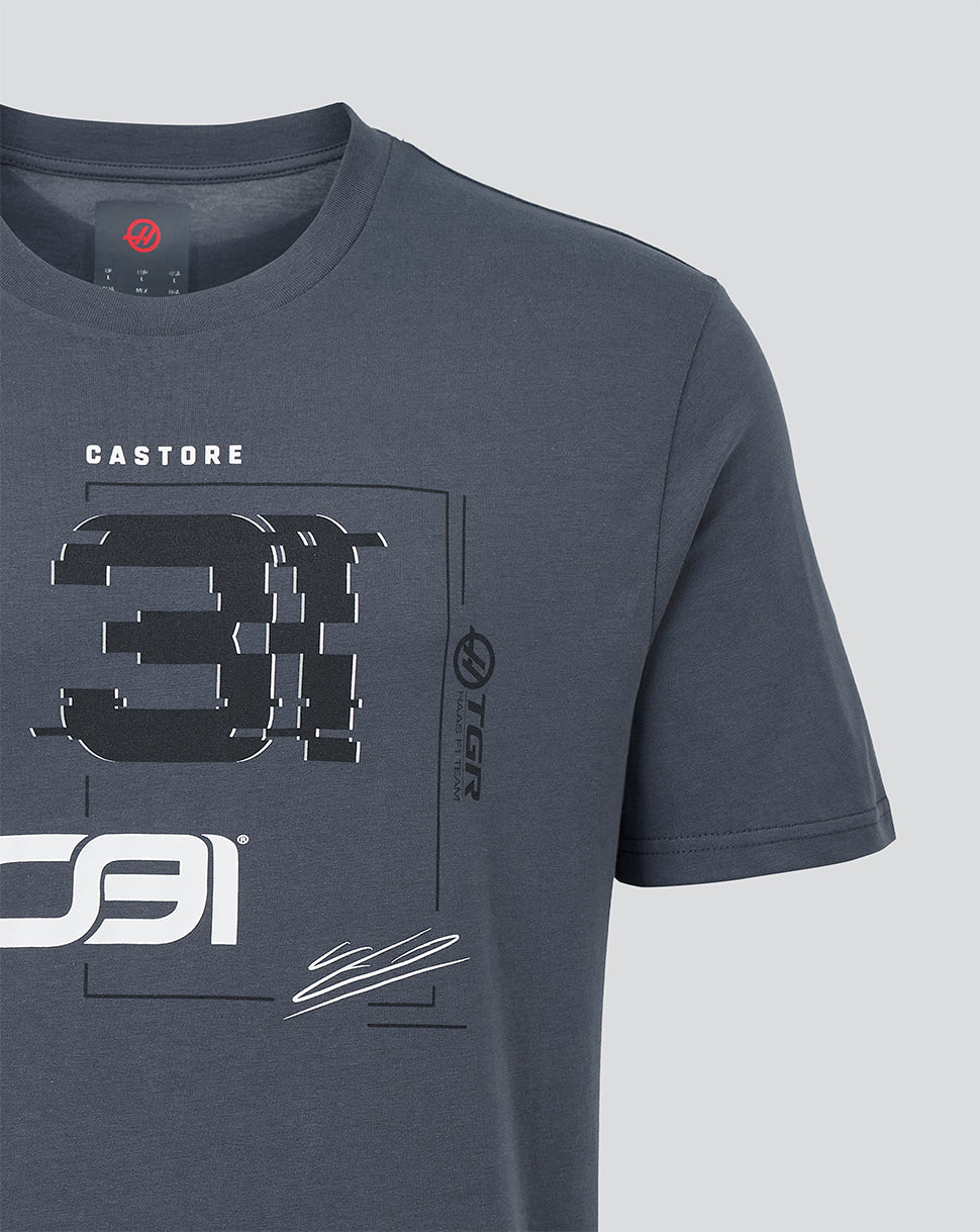 A close-up of a dark slate gray Castore T-shirt featuring a large black and white graphic print on the front with the number 31 and brand logos.