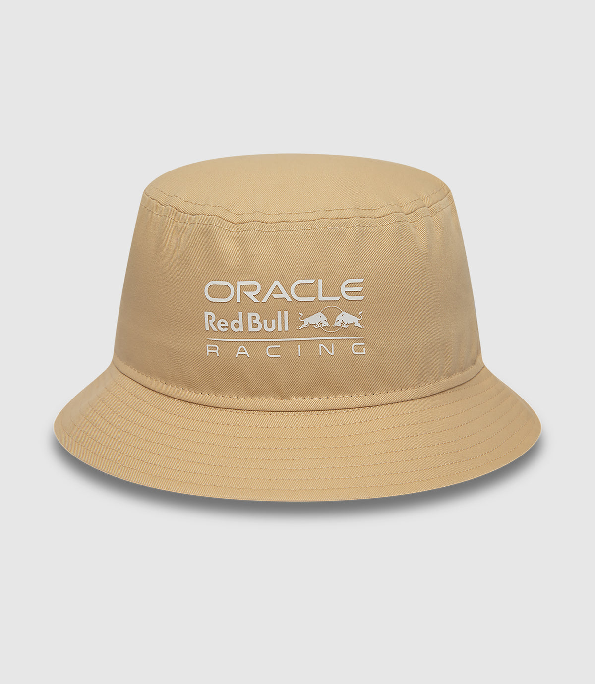Sand colored bucket hat with Oracle Red Bull Racing logo on the front and New Era flag on the side