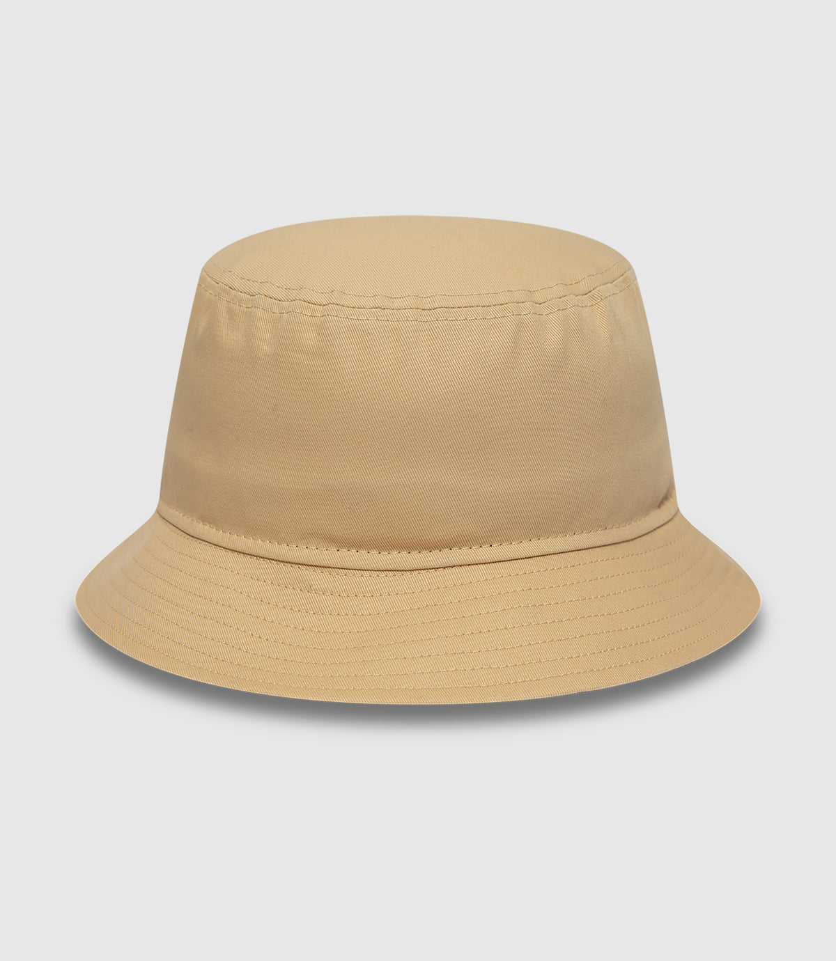 Beige bucket hat close-up focusing on crown stitching and curved brim