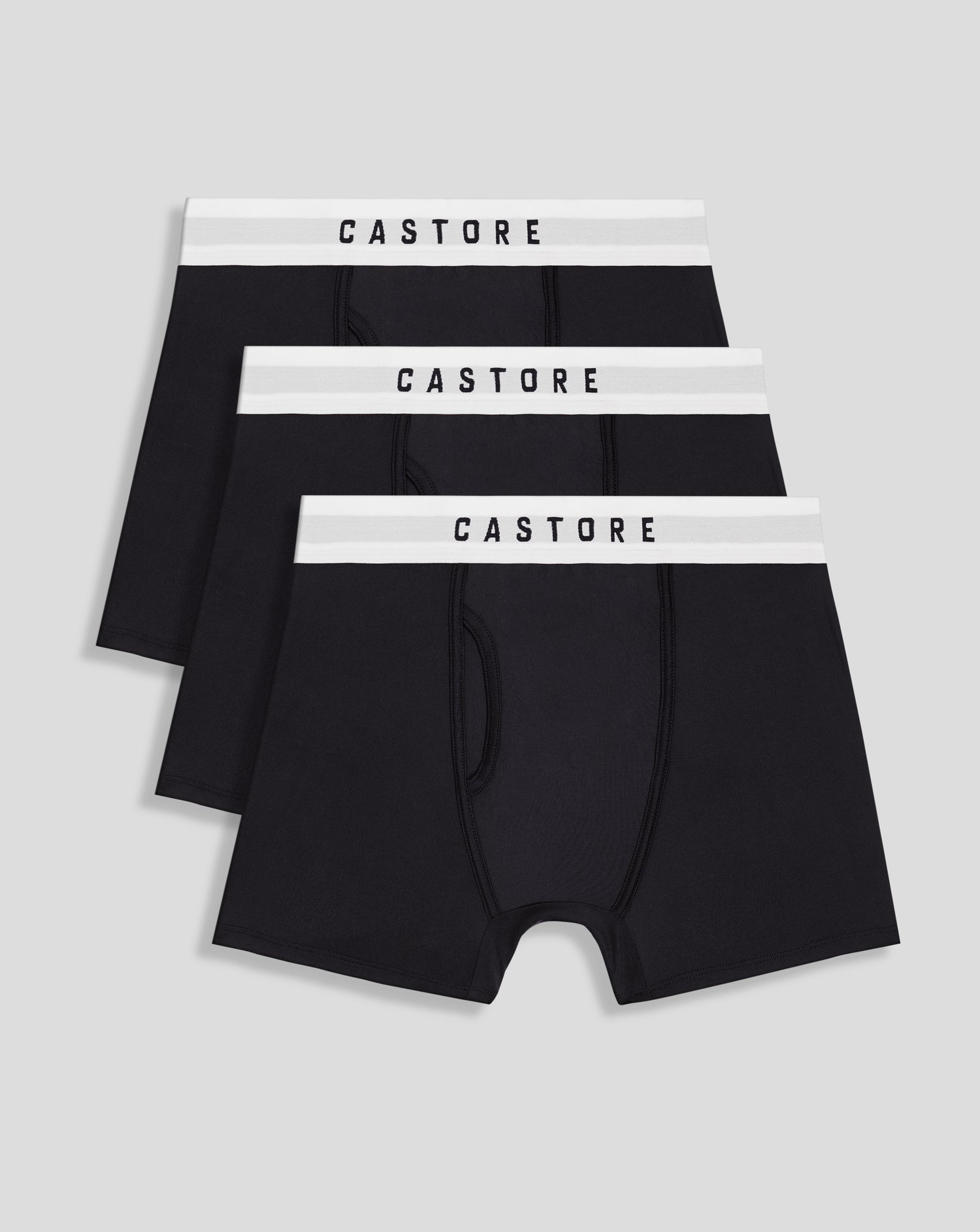 Three black boxer shorts with white elastic waistband featuring CASTORE logo