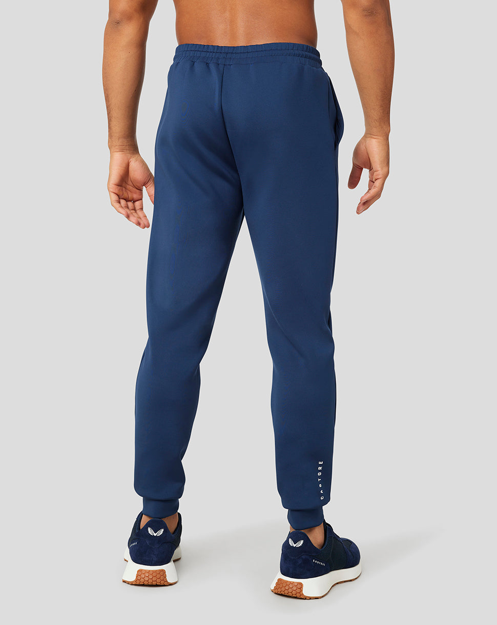 Back view of navy Peacoat Flex Jogger with an elastic waistband and tapered cuffs.