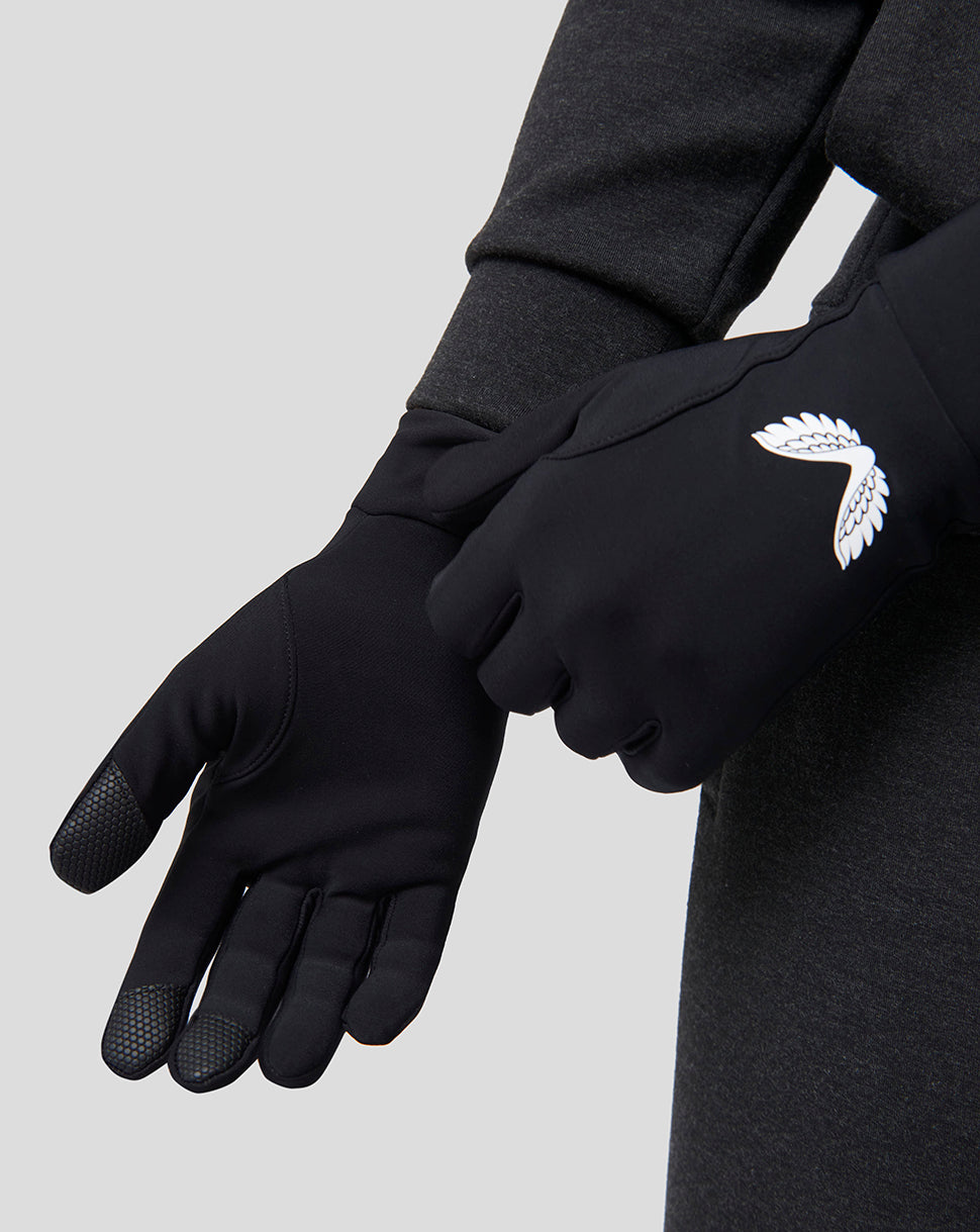 Close-up of black Onyx Performance Glove with white wing logo on the back of the hand and textured fingertip area.