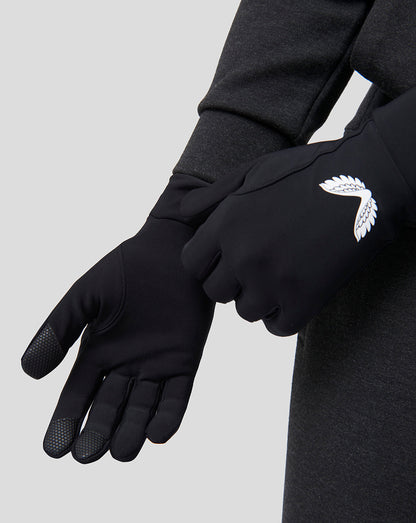 Close-up of black Onyx Performance Glove with white wing logo on the back of the hand and textured fingertip area.