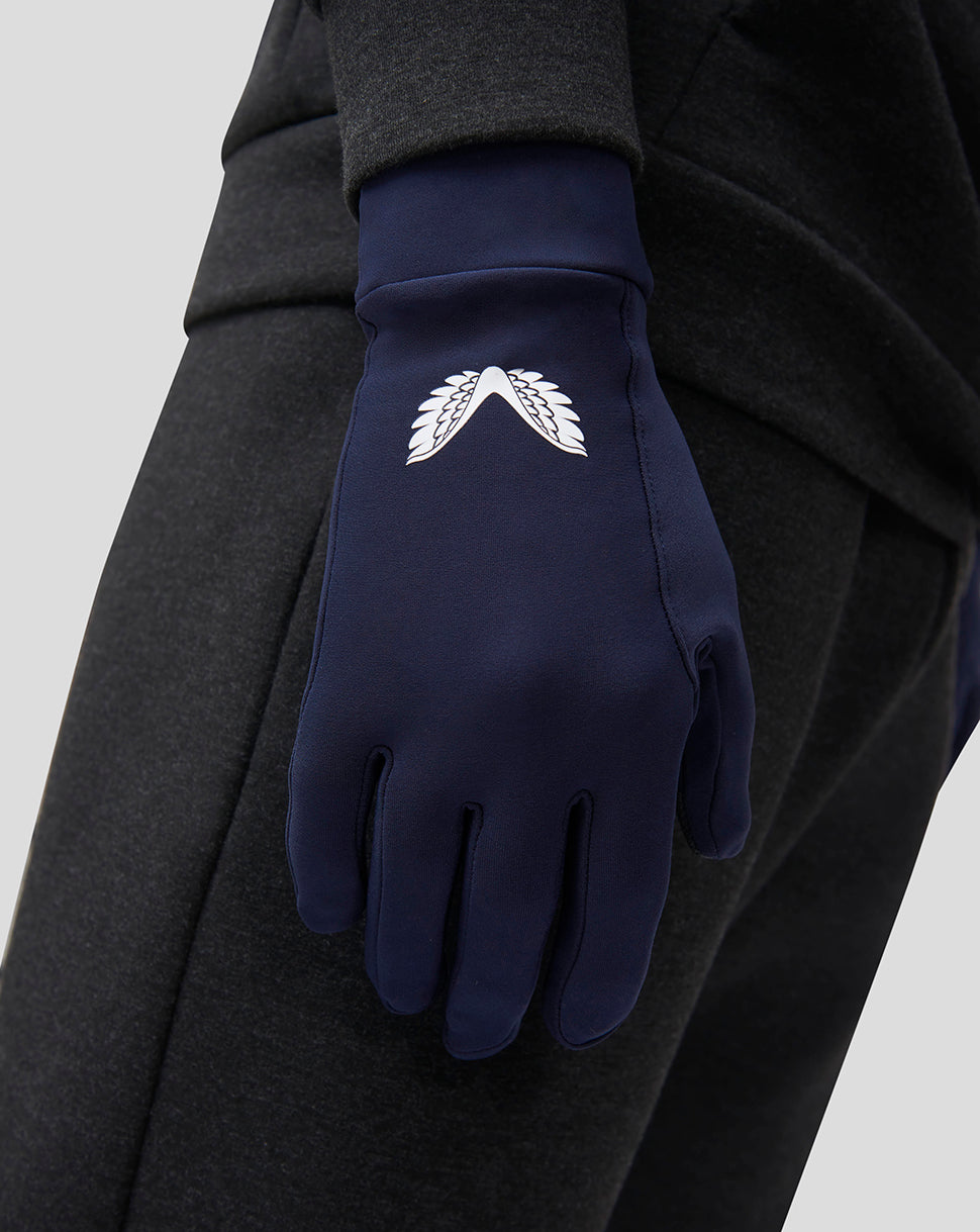 Close up of navy Peacoat Performance Glove showing white logo on the back.